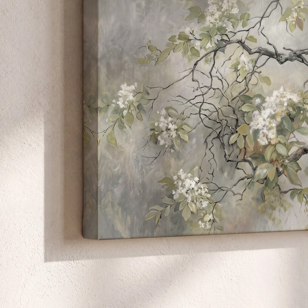 Trailing white blossoms and delicate green branches on pale gray 3 piece canvas wall art material and edge close up