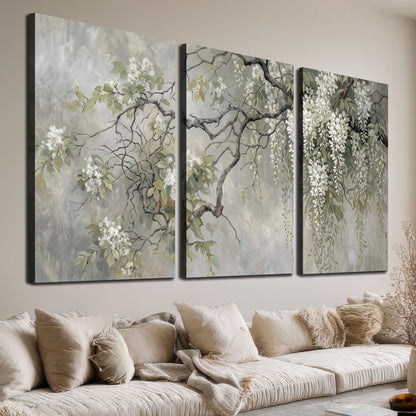Trailing white blossoms and delicate green branches on pale gray 3 piece canvas wall art room and product view