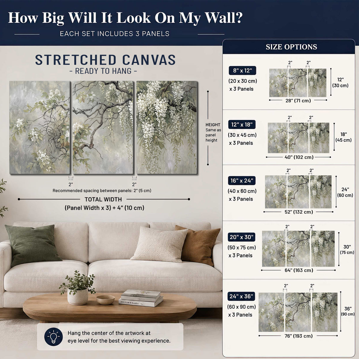 Trailing white blossoms and delicate green branches on pale gray 3 piece canvas wall art size guide above a sofa; room view is illustrative