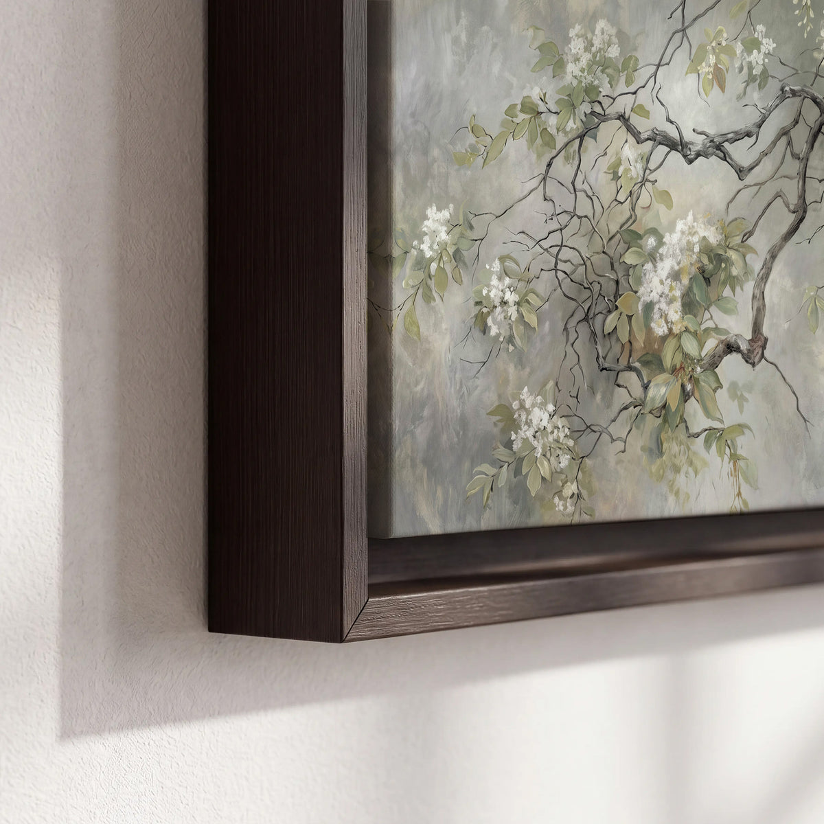 Trailing white blossoms and delicate green branches on pale gray 3 piece framed canvas wall art material and edge close up