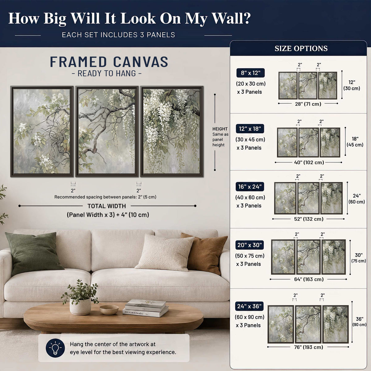 Trailing white blossoms and delicate green branches on pale gray 3 piece framed canvas wall art size guide above a sofa; room view is illustrative