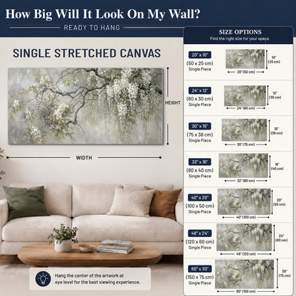 Trailing white blossoms and delicate green branches on pale gray single canvas wall art size guide above a sofa; room view is illustrative