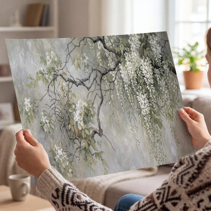 Trailing white blossoms and delicate green branches on pale gray single poster print held in hands