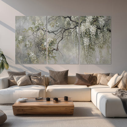 Trailing white blossoms and delicate green branches on pale gray set of 3 poster prints displayed in a living room