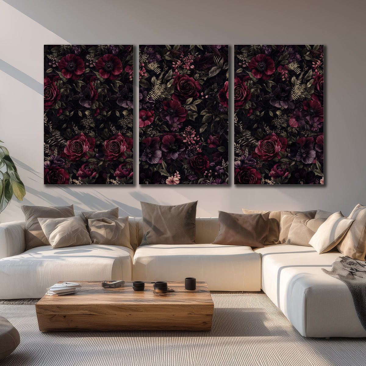 Deep burgundy roses and small pale flowers on a dark background 3 piece canvas wall art displayed in a living room