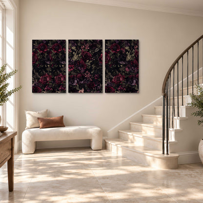 Deep burgundy roses and small pale flowers on a dark background 3 piece canvas wall art styled in an interior
