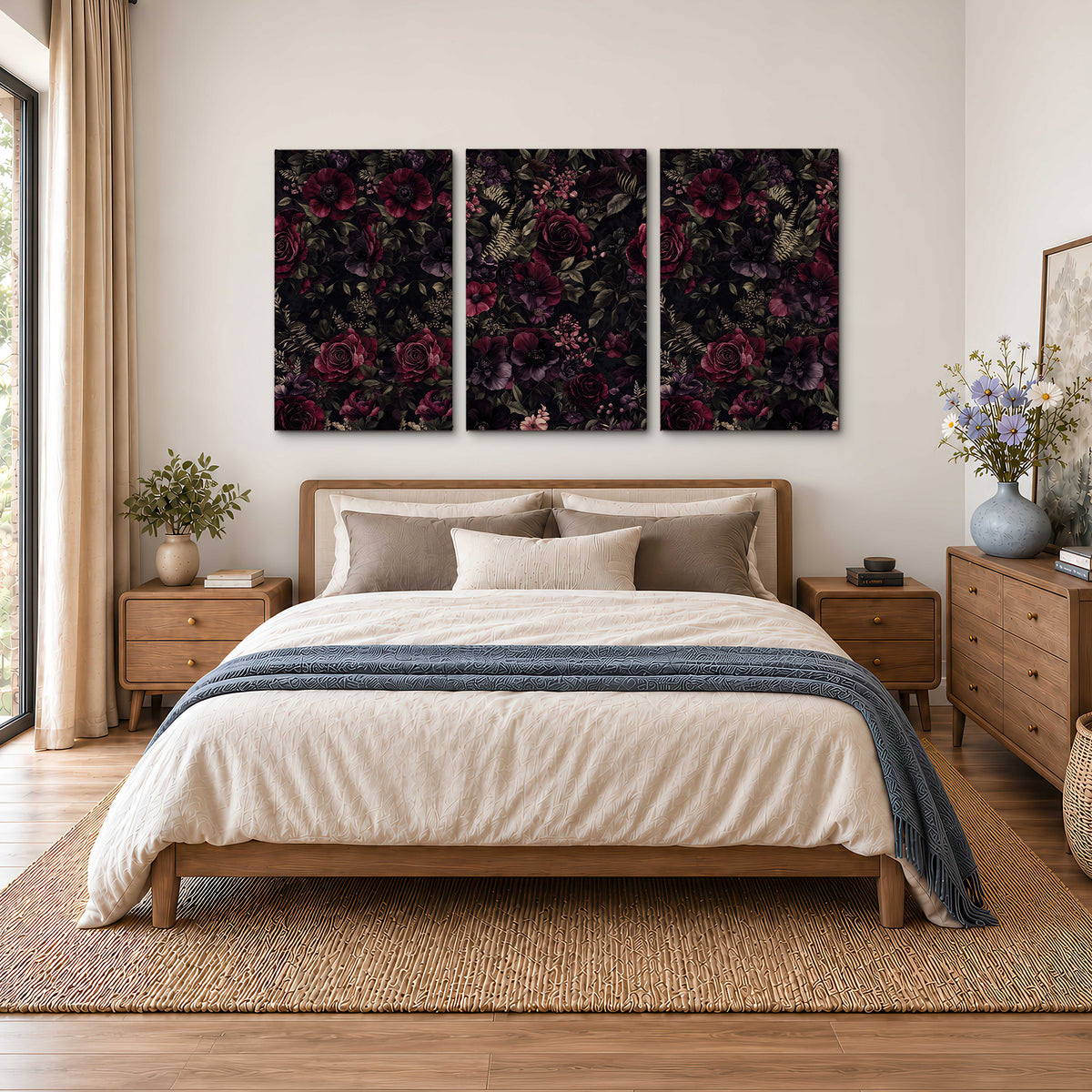 Deep burgundy roses and small pale flowers on a dark background 3 piece canvas wall art styled in an interior