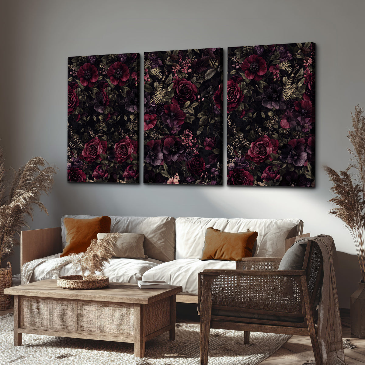 Deep burgundy roses and small pale flowers on a dark background 3 piece canvas wall art displayed in a rustic living room