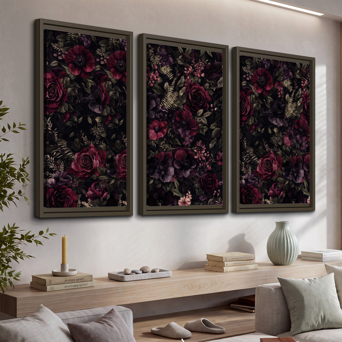 Deep burgundy roses and small pale flowers on a dark background 3 piece framed canvas wall art displayed in a console
