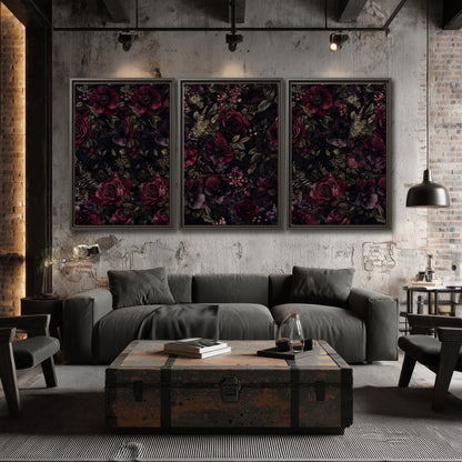 Deep burgundy roses and small pale flowers on a dark background 3 piece framed canvas wall art displayed in a industrial room