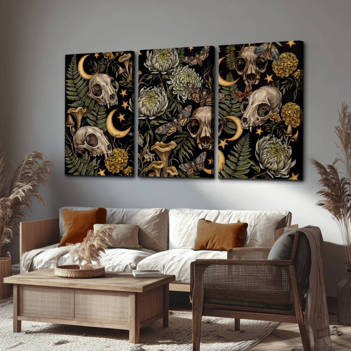 Decorative animal skulls, moons, stars, mushrooms and botanical leaves 3 piece canvas wall art displayed in a rustic living room
