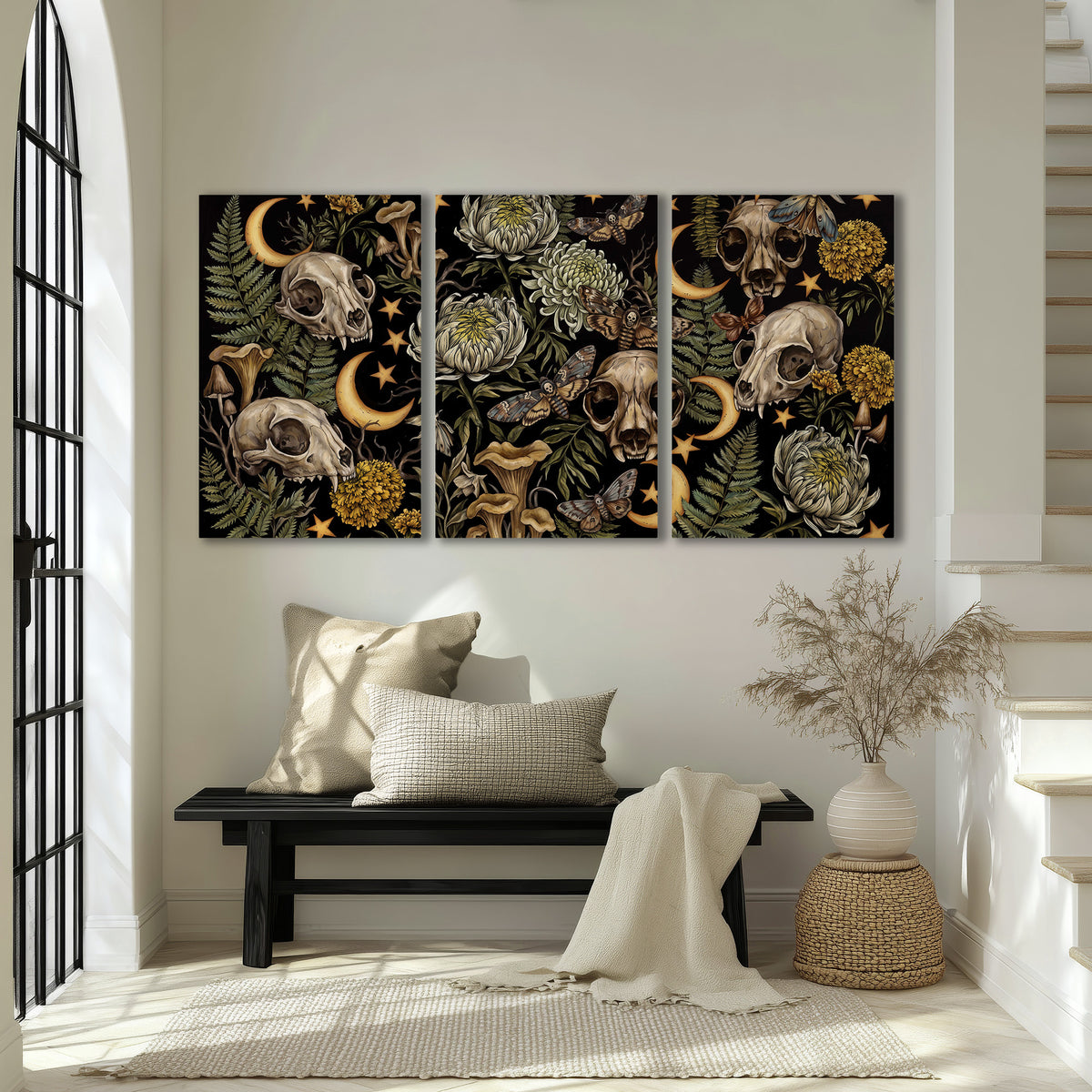 Decorative animal skulls, moons, stars, mushrooms and botanical leaves 3 piece canvas wall art displayed in a entryway