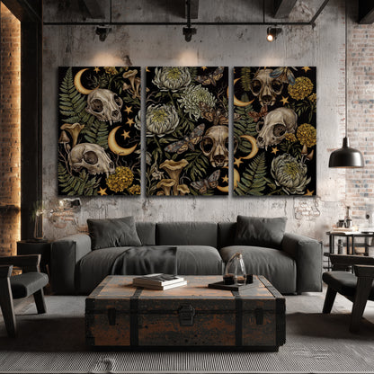 Decorative animal skulls, moons, stars, mushrooms and botanical leaves 3 piece canvas wall art displayed in a industrial room