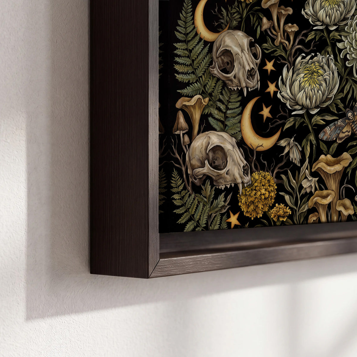 Decorative animal skulls, moons, stars, mushrooms and botanical leaves 3 piece framed canvas wall art material and edge close up
