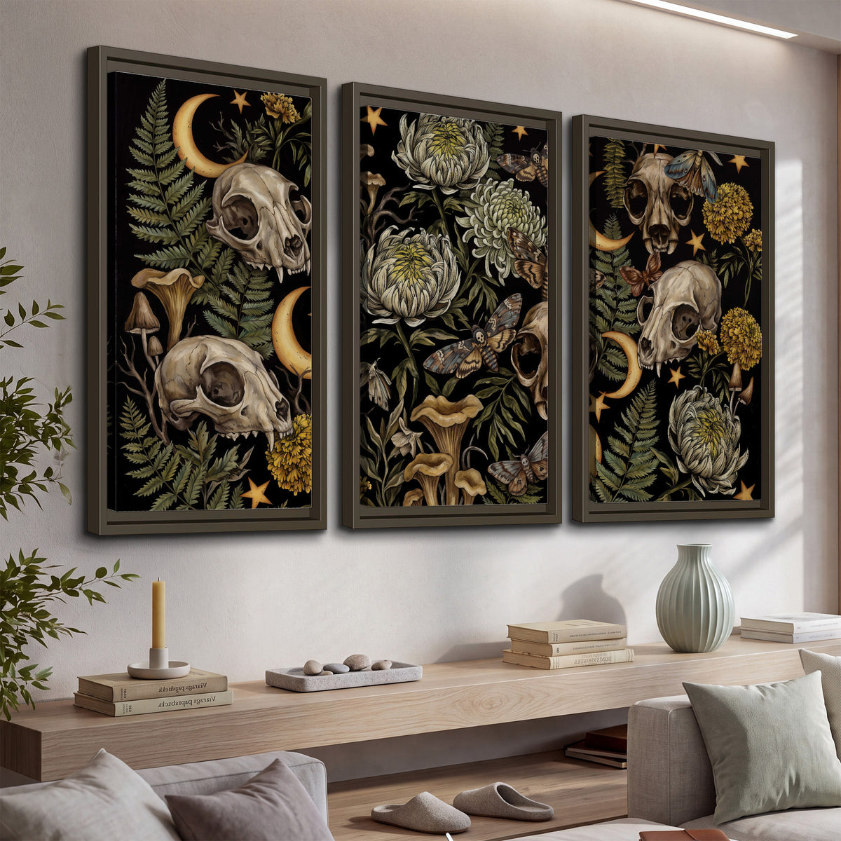 Decorative animal skulls, moons, stars, mushrooms and botanical leaves 3 piece framed canvas wall art displayed in a console