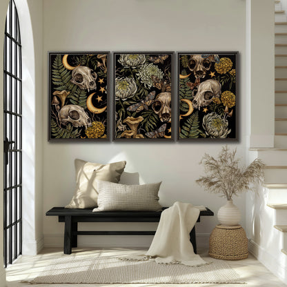 Decorative animal skulls, moons, stars, mushrooms and botanical leaves 3 piece framed canvas wall art displayed in a entryway
