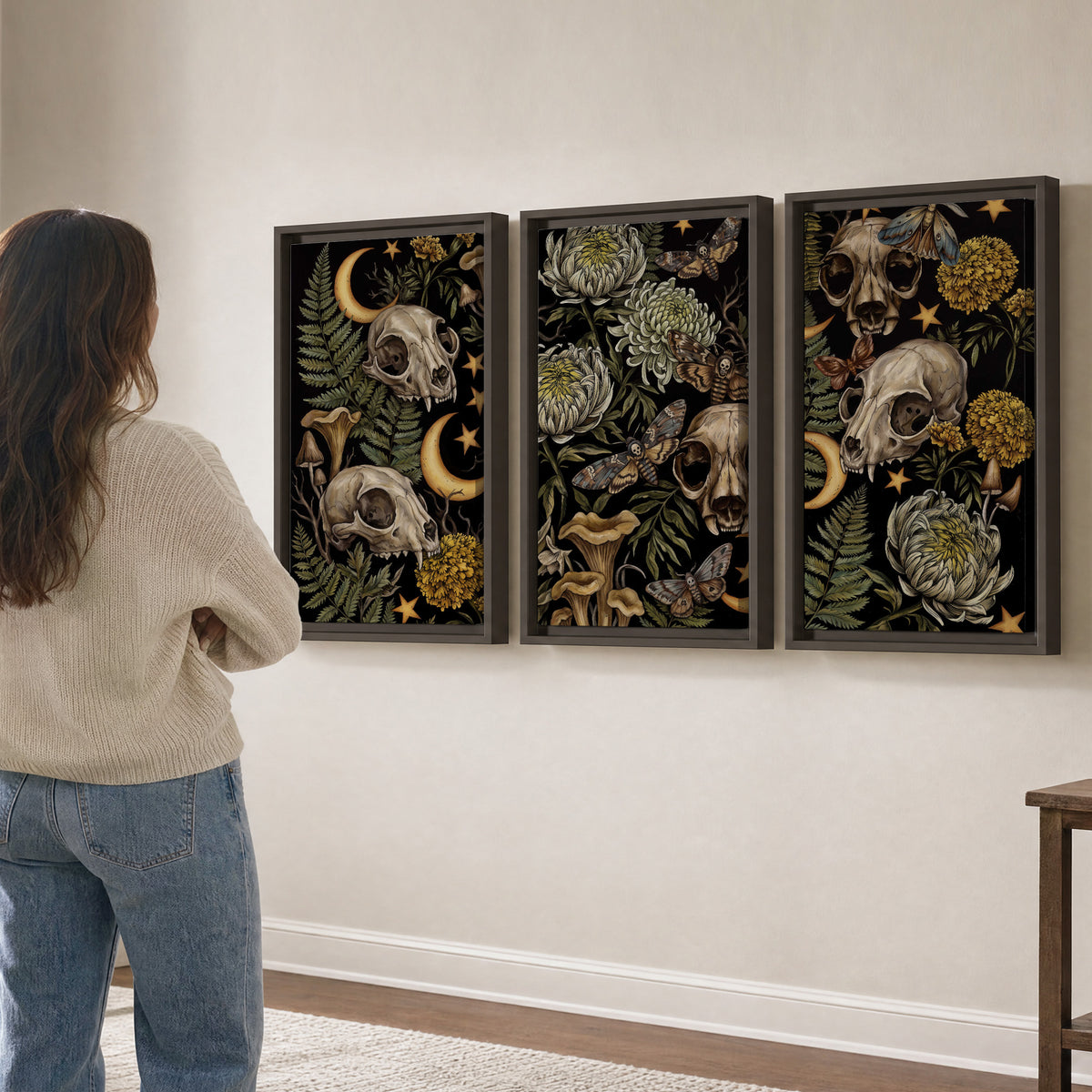 Decorative animal skulls, moons, stars, mushrooms and botanical leaves 3 piece framed canvas wall art three panel arrangement on a wall