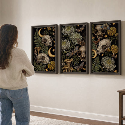 Decorative animal skulls, moons, stars, mushrooms and botanical leaves 3 piece framed canvas wall art three panel arrangement on a wall