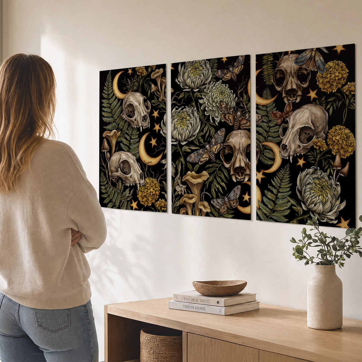 Decorative animal skulls, moons, stars, mushrooms and botanical leaves set of 3 poster prints three panel arrangement on a wall