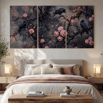 Black ravens perched among pink roses and dark branches 3 piece canvas wall art displayed in a bedroom