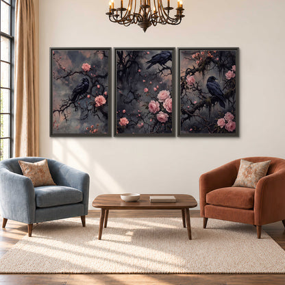 Black ravens perched among pink roses and dark branches 3 piece framed canvas wall art styled in an interior