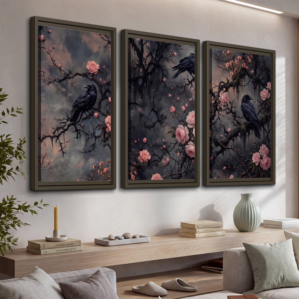Black ravens perched among pink roses and dark branches 3 piece framed canvas wall art displayed in a console