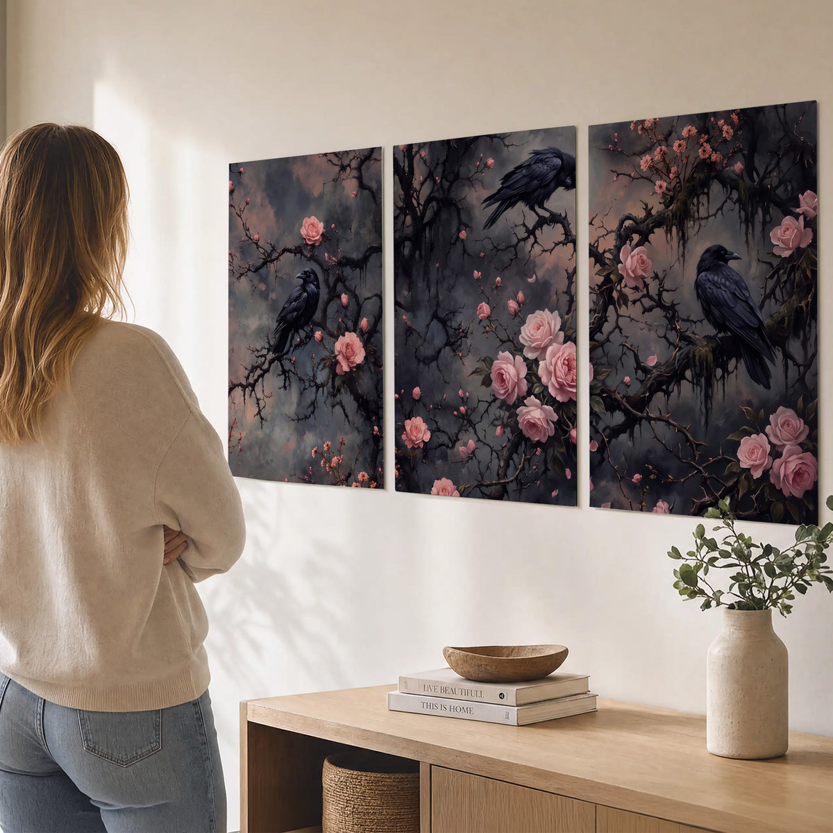 Black ravens perched among pink roses and dark branches set of 3 poster prints three panel arrangement on a wall