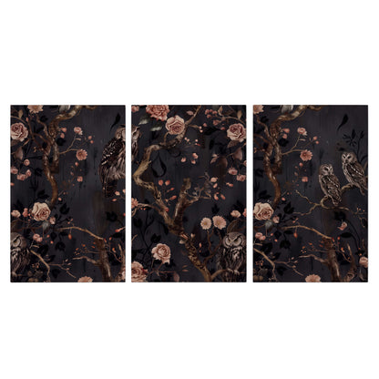 Owls among curling branches and dusty pink flowers on dark gray 3 piece canvas wall art viewed straight on