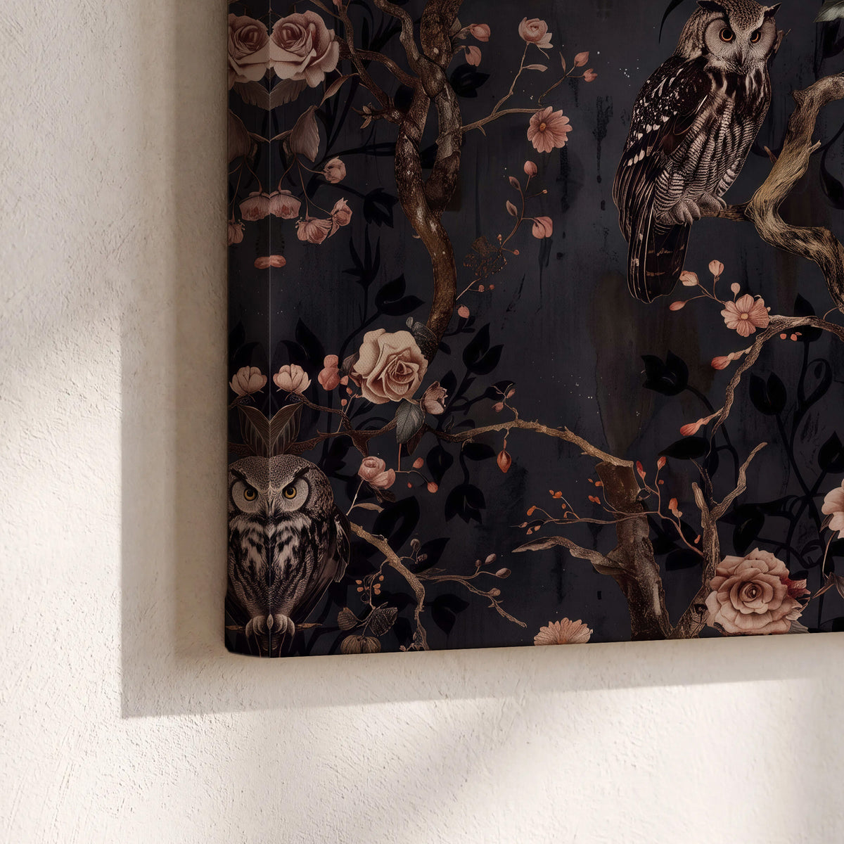Owls among curling branches and dusty pink flowers on dark gray 3 piece canvas wall art material and edge close up