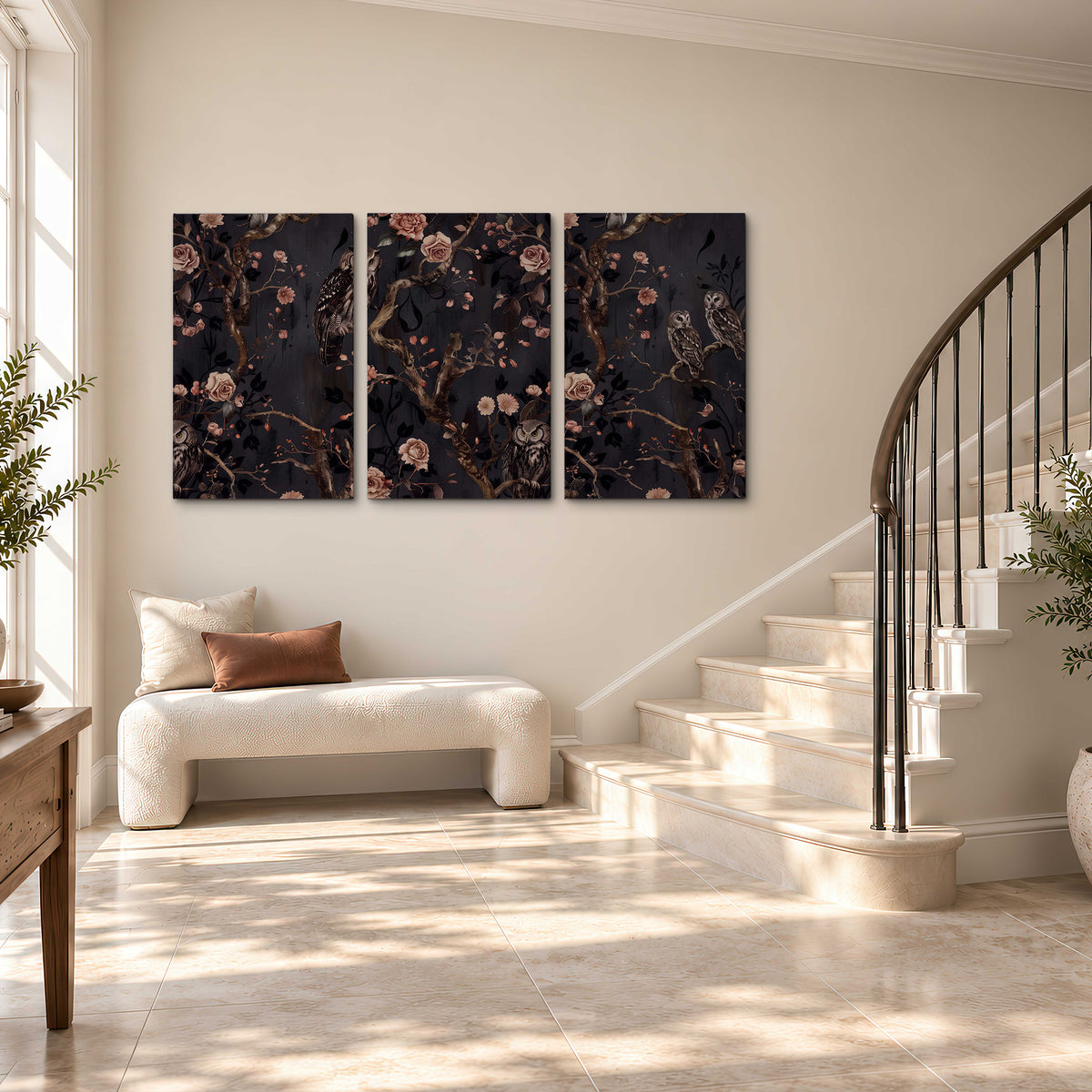 Owls among curling branches and dusty pink flowers on dark gray 3 piece canvas wall art styled in an interior