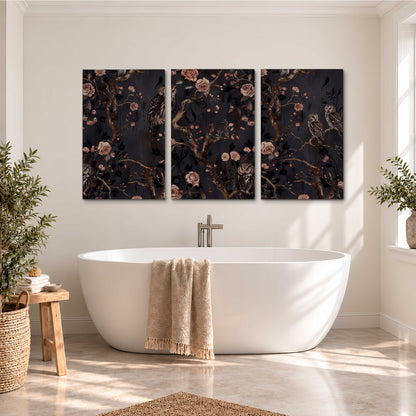 Owls among curling branches and dusty pink flowers on dark gray 3 piece canvas wall art styled in an interior