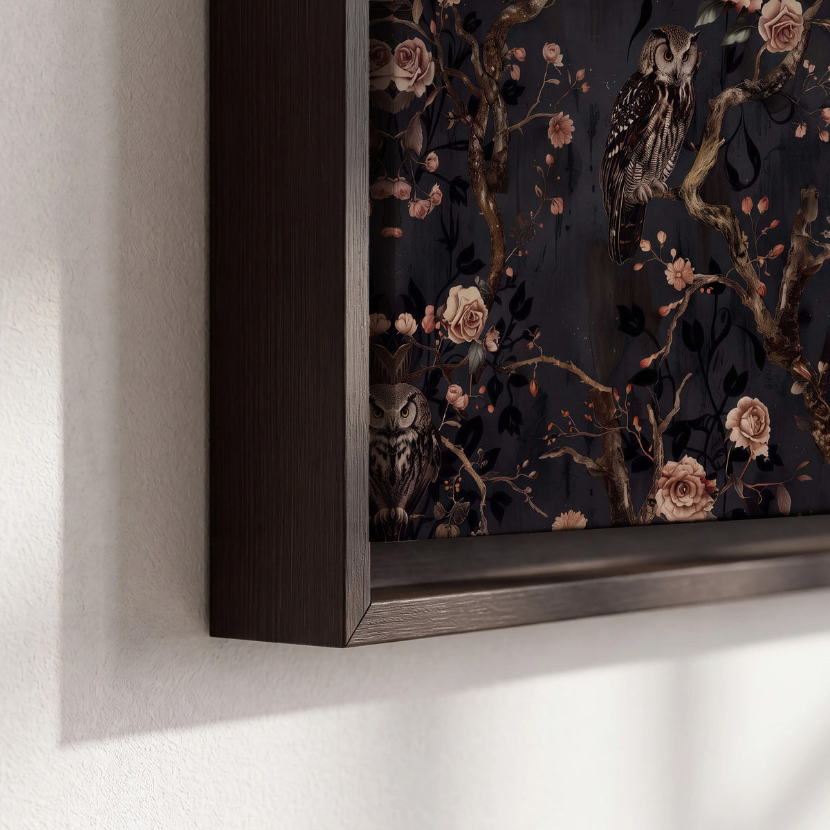 Owls among curling branches and dusty pink flowers on dark gray 3 piece framed canvas wall art material and edge close up