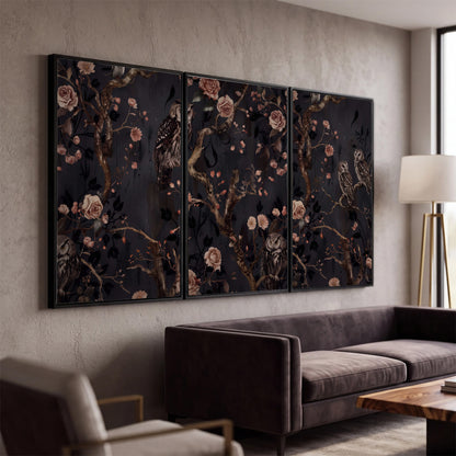 Owls among curling branches and dusty pink flowers on dark gray 3 piece framed canvas wall art displayed in a modern living room