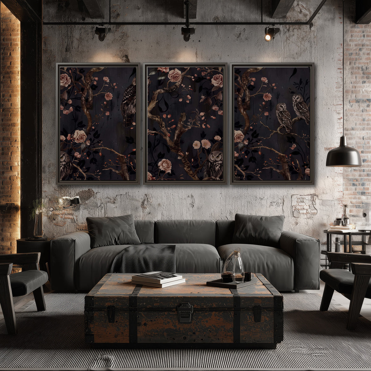 Owls among curling branches and dusty pink flowers on dark gray 3 piece framed canvas wall art displayed in a industrial room