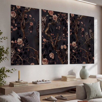 Owls among curling branches and dusty pink flowers on dark gray set of 3 poster prints displayed in a console