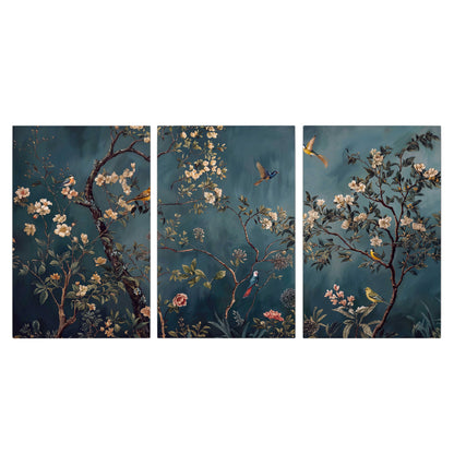 Colorful birds and pale blossoms on branches against teal blue 3 piece canvas wall art viewed straight on