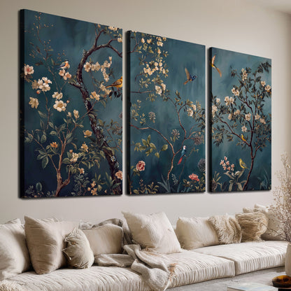 Colorful birds and pale blossoms on branches against teal blue 3 piece canvas wall art room and product view