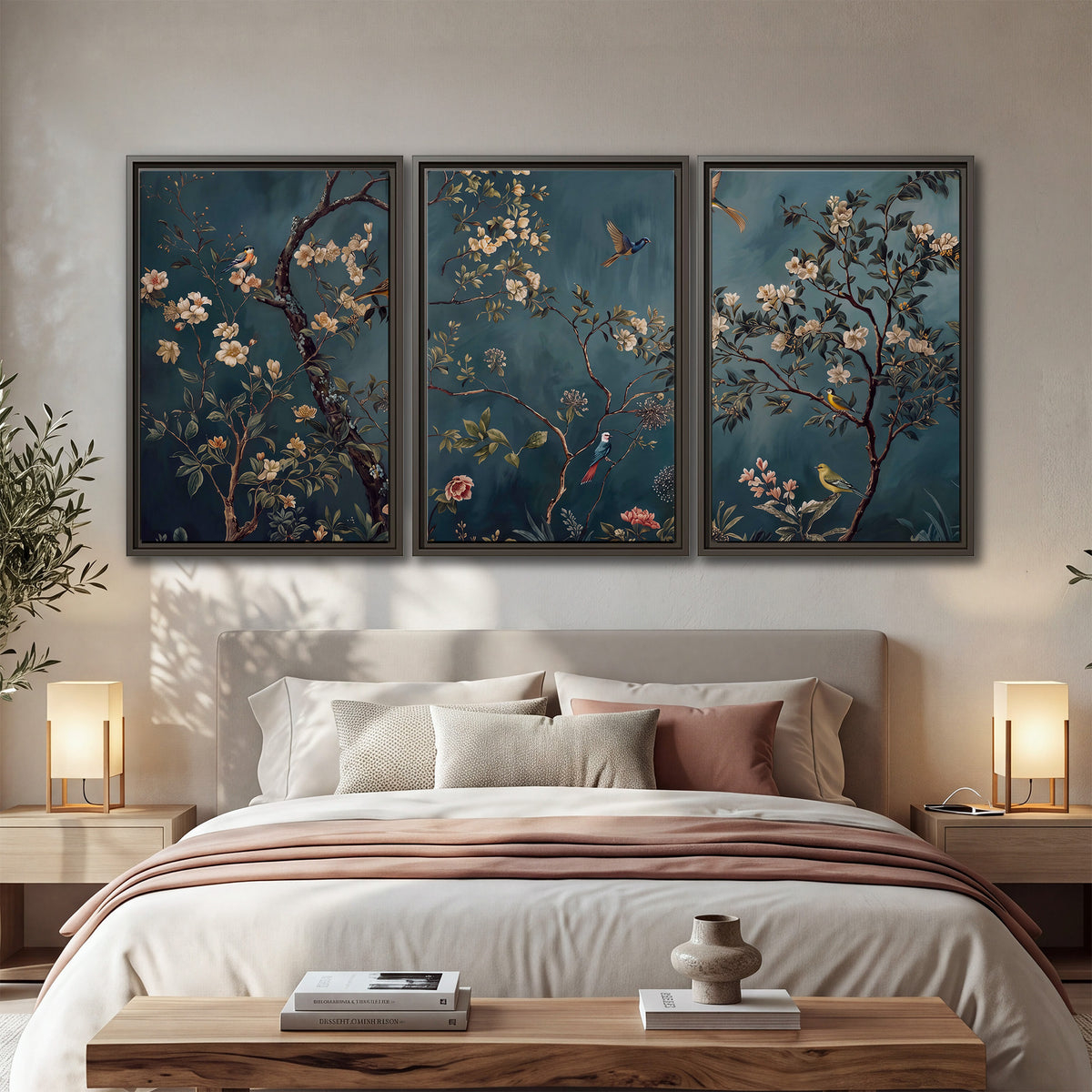 Colorful birds and pale blossoms on branches against teal blue 3 piece framed canvas wall art displayed in a bedroom