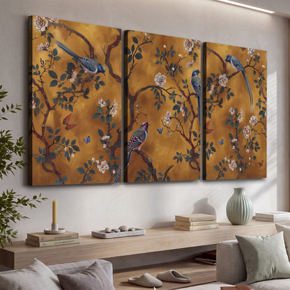 Colorful perched birds and pale blossoms on an ochre background 3 piece canvas wall art displayed in a console
