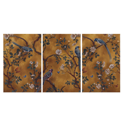 Colorful perched birds and pale blossoms on an ochre background set of 3 poster prints viewed straight on