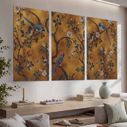 Colorful perched birds and pale blossoms on an ochre background set of 3 poster prints displayed in a console