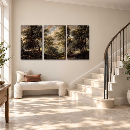 Old trees framing a softly lit woodland path 3 piece canvas wall art styled in an interior