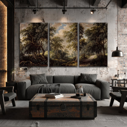 Old trees framing a softly lit woodland path 3 piece canvas wall art displayed in a industrial room
