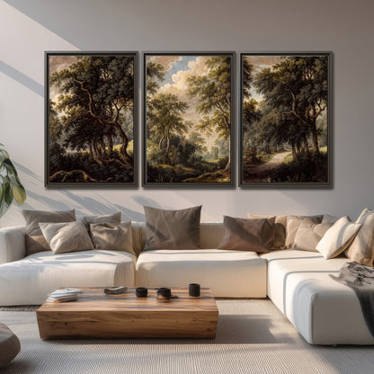 Old trees framing a softly lit woodland path 3 piece framed canvas wall art displayed in a living room