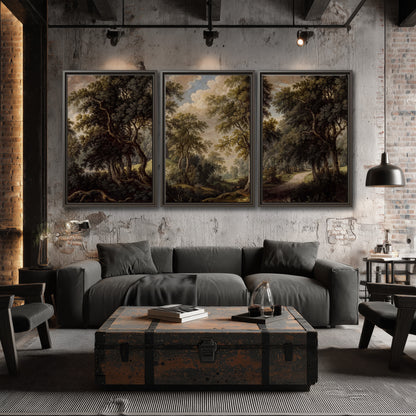 Old trees framing a softly lit woodland path 3 piece framed canvas wall art displayed in a industrial room