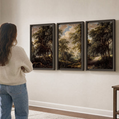 Old trees framing a softly lit woodland path 3 piece framed canvas wall art three panel arrangement on a wall