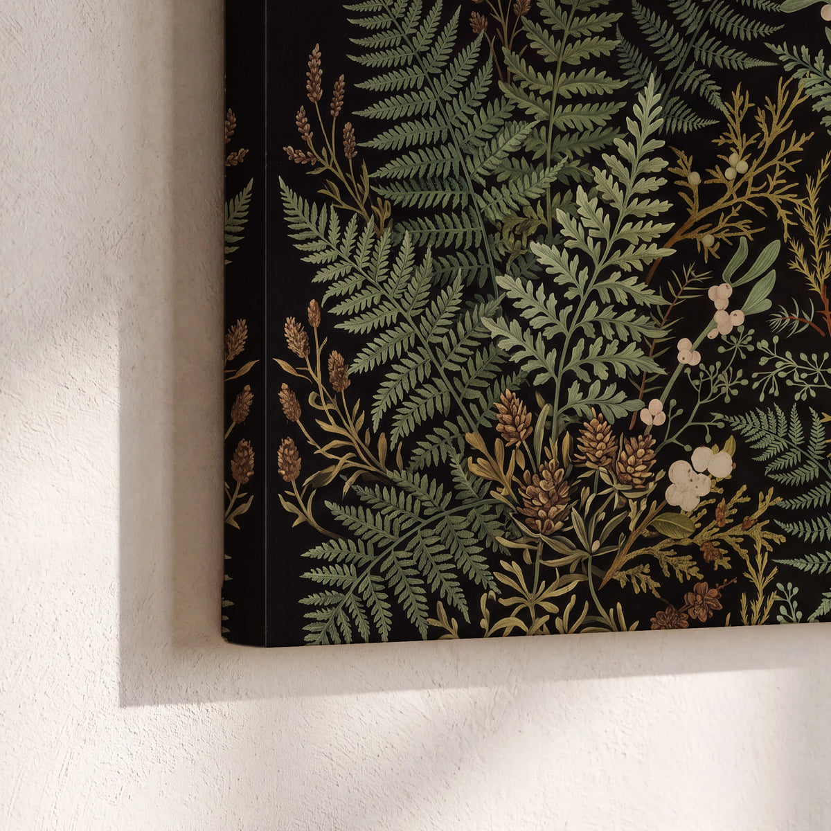 Layered green ferns and delicate cream flowers on a black background 3 piece canvas wall art material and edge close up