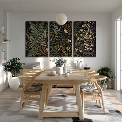 Layered green ferns and delicate cream flowers on a black background 3 piece canvas wall art room and product view