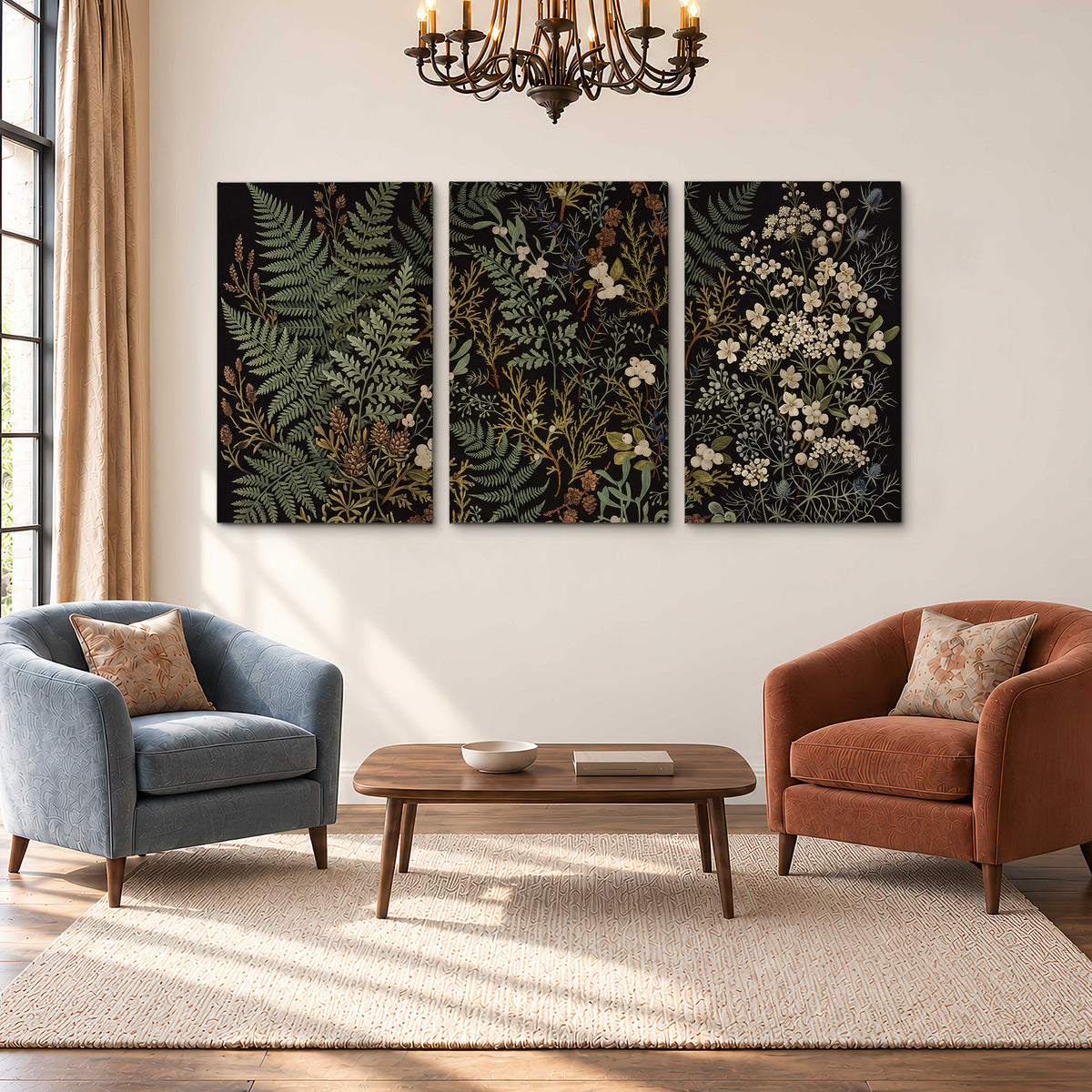Layered green ferns and delicate cream flowers on a black background 3 piece canvas wall art styled in an interior