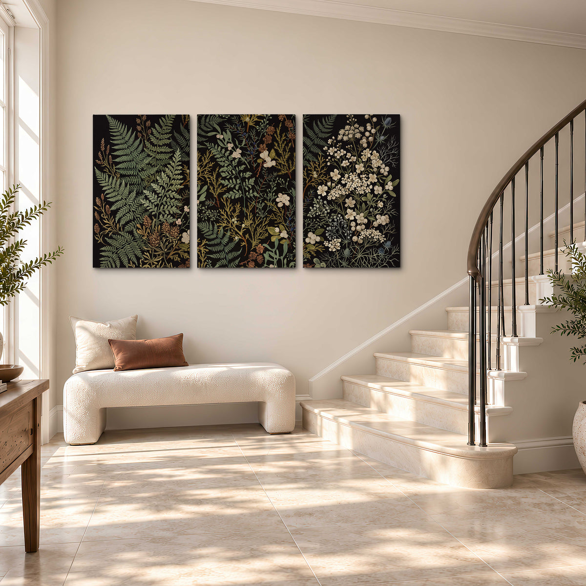 Layered green ferns and delicate cream flowers on a black background 3 piece canvas wall art styled in an interior